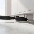 TESLA GlideStar GQ500 - low mop head cleaning under a cabinet with the handle lowered