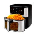 TESLA AirCook Q60 XXL Pro fryer with an open drawer, full of crispy fries and onion rings, ready to serve.